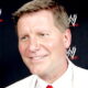 John Laurinaitis Deletes Tweet After Being Accused Of Using AI To Generate Fake Crowd At Signing Event